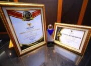 OJK Raih Predikat Badan Publik Terbaik Nasional Tahun 2025