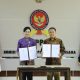 OJK Bersama KPPU Teken Kesepahaman Perkuat Pengawasan Sektor Keuangan Nasional